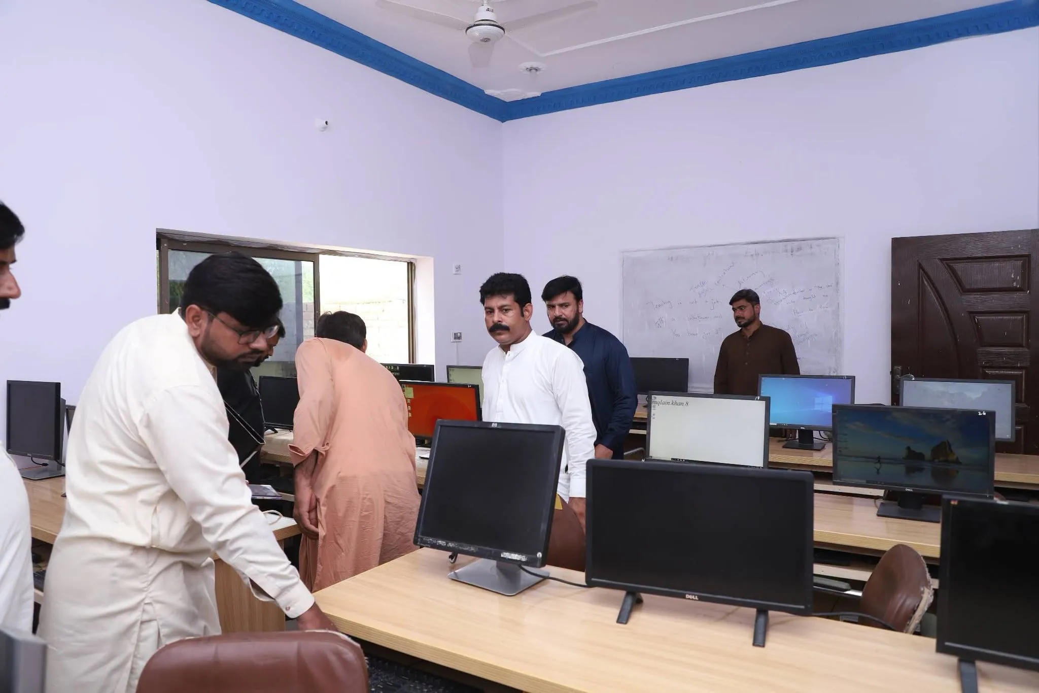 Staff during an inspection visit to the computer laboratory
